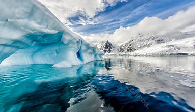 Iceberg floats in Andord Bay on Graham Land, Antarctica