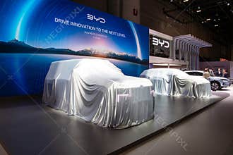 BYD Yangwang U8 luxury EV SUV car veiled under a cover, awaiting its official reveal at the Geneva International Motor Show