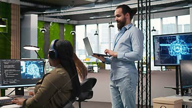 Team of programmers in office developing software applications using AI