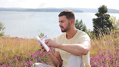 Author writing around inspiring nature