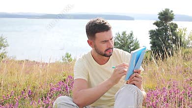Author writing around inspiring nature