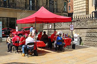 People at a Scientology Stall in Edinburgh