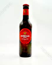 A bottle of Estrella beer isolated against a white background.