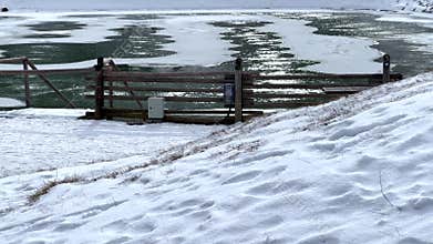 Frozen lake reflecting sunlight