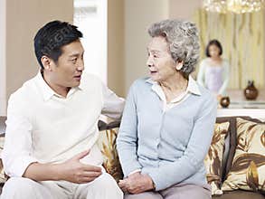 Senior mother and adult son