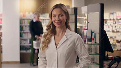 Smiling Caucasian woman doctor pediatrician therapist practitioner female intern medical health care adviser physician