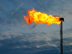 Burning oil gas flare