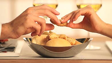 Couple at restaurant , bread