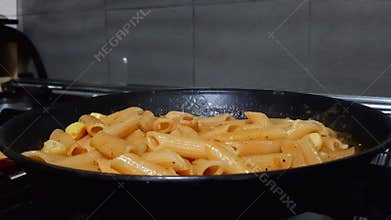 Steaming Yellow Curry Penne Pasta With Potato In Pan European Gourmet Kitchen