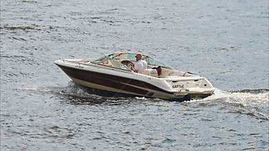 Russia, St.Petersburg, 29 July 2023: slow motion footage of a small boat on the water in Saint Petersburg