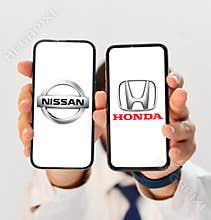 Nissan and Honda merging as largest automakers in the industry, illustrative editorial shown