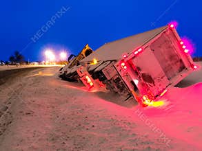 Transport Truck in Winter Ditch Evening