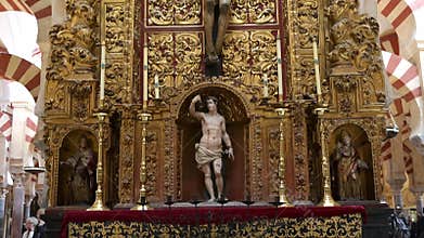 Golden Wooden Altar with Crucifix and Apostles in Mezquita