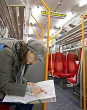 Tourist reading directions