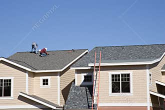 Roofers working on new roof