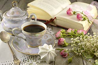 Coffee cup with poetry book