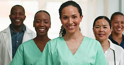 Diverse Medical Team of Doctors and Nurses Smiling Confidently in Hospital Setting