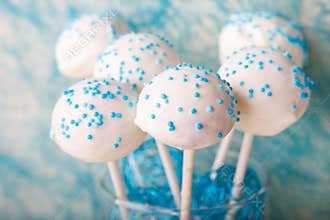 Wedding cake pops in white and soft blue.