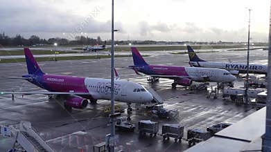 Wizz Air and Ryanair planes at Brussels South Charleroi Airport (CRL) at sunset, Belgium