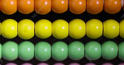 colorful wooden beads on abacus for childrens play