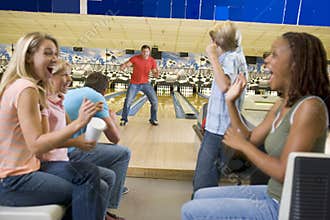 Families on trip to bowling alley