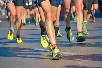Marathon running race, people feet on road