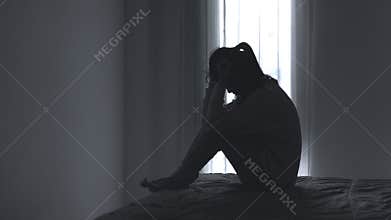 The slow-motion video shows a woman suffering from depression at home, experiencing insomnia, constant feelings of worthlessness