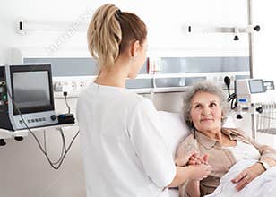 An elderly woman in a hospital ward. Recovery after surgery, patient in the ward