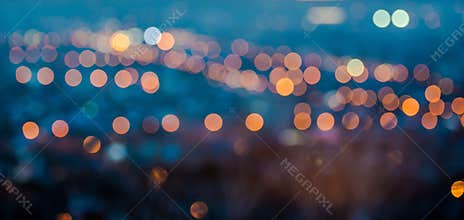 City blurring lights abstract circular bokeh on blue background
