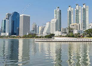 Bangkok City Skyline and Benjakitti Park Lake Reflection
