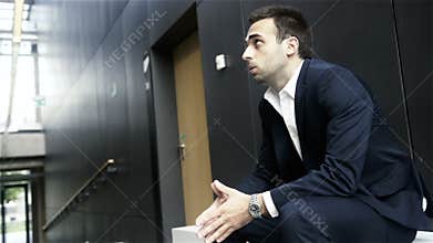 Anxious man in a waiting room before his job interview