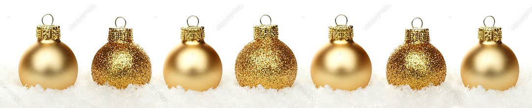 Christmas border of baubles in snow isolated