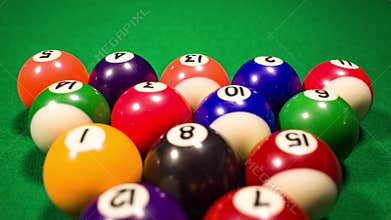 Billiard balls on green baize