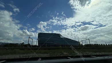 Modern glass building stationary, in outdoor daytime, with modern glass building
