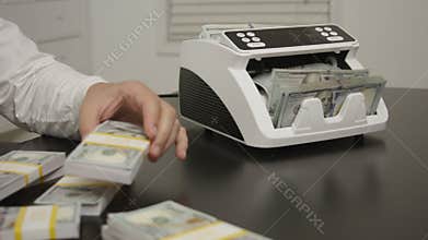 Business man counting dollars close-up. Banker counting money. Office scene with hands count money. Counting cash close up
