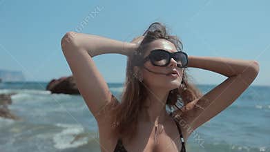 girl in black bikini with rhinestones having