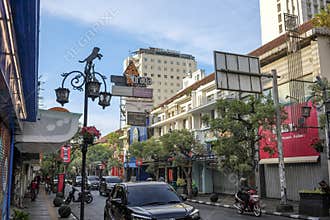 Braga City Walk Street View with Colonial Architecture and Urban Traffic in Bandung