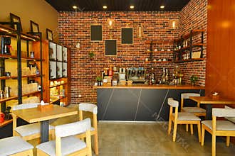 Modern Cafe Interior with Cozy Decoration and Brick Wall