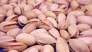 Roasted Salted Pistachios Falling Close Up, Healthy Snack Nuts Macro Food Background, India