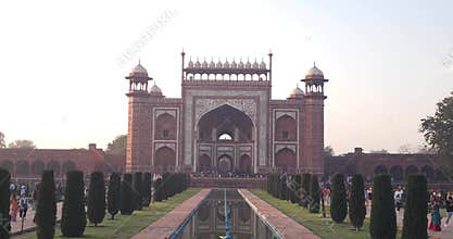 Taj Mahal in bright daylight showcasing white marble architecture and symmetry. Iconic UNESCO World Heritage site in Agra, India