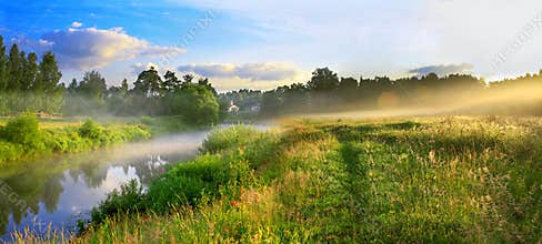 Panorama of a summer landscape with sunrise, fog and the river