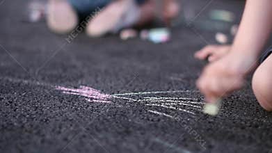 Kids drawing on the playground