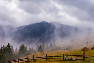 Global warming. mountain landscape. Clouds and fog