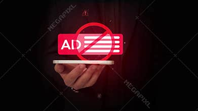 Businessman in a dark suit holding a smartphone presenting glowing red ad blocker symbol for ad free internet browsing