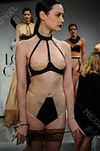 NEW YORK, NY - OCTOBER 25: Models pose during Love Cage Spring 2015 lingerie presentation