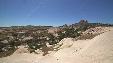 Cappadocia fairy chimneys and sculpted volcanic landforms appear in Turkiye, valley, badlands, rock formations, volcanic tuff