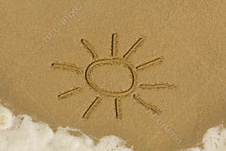 Sun drawing in the sand