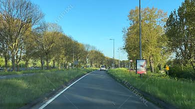 Driving on highway and rural roads near Amsterdam, Netherlands, with farmland and