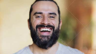 Happy laughing man with beard