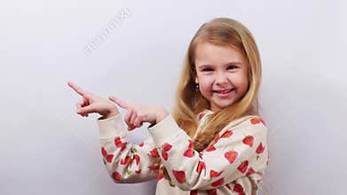 Positive kid presenting product over white background